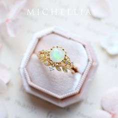 "Our current turnaround time for regular orders is 6-8 weeks. For urgent orders, please shop our Ready-to-Ship collection below (7-10 business days): https://michellia.com/collections/ready-to-ship (please copy and paste into browser) -------- 「Evanthe」- Vintage Floral Ring, in Opal | R2001 One of our most iconic designs, our signature vintage floral collection combines the essence of Art Nouveau with effortless modern elegance. Inspired by the goddess of flowers, this timelessly beautiful desig Gold Opal Ring With Halo Setting, Gold Opal Ring With Halo Design, Luxury Gold Opal Ring With Prong Setting, Rose Gold Hallmarked Flower Ring For Wedding, Gold Opal Ring With Rose Cut Diamonds For Anniversary, Gold Opal Halo Ring For Anniversary, Gold Opal Ring With Halo For Anniversary, Gold Opal Ring With Halo Design - Gift, Anniversary Gold Opal Ring With Rose Cut Diamonds