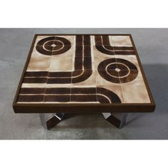 a coffee table with an artistic design on it