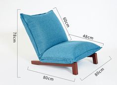 a blue chair sitting on top of a white floor next to a wooden frame with measurements