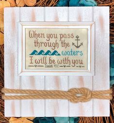 a cross - stitch pattern with the words when you pass through the waters, i will be both you