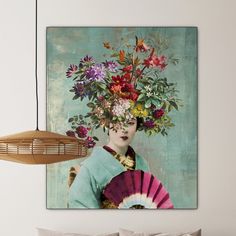 a woman with flowers on her head holding a fan