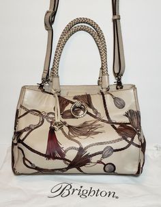 BRIGHTON LUCIANA CROSSBODY LEATHER PURSE Retail $450.000 INCLUDES ,DUST BAG, AND BRIGHTON BOX THIS EQUESTRIAN-INSPIRED DESIGN BY CARMEN RADULESCU FOR THE BRIGHTON FERRERA NOVELLA COLLECTION CASUAL SOPHISTICATION. MADE OF PRINTED LEATHER.  Measurements: Bottom Width: 12.50 in. Depth: 5 1⁄2 in. Height: 9 in. 8" STRAP DROP TO 26" DOUBLE HANDELS AND CROSSBODY STRAP INTERIOR ONE ZIPP CLOSE INNER DIVIDER ONE LARGE ZIP POCKET ON EACH SIDE WALL 2 BRIGHTON SIGNATURE POUCHES AND TWO LARGE MAIN SECTIONS CL Printed Leather, Rebecca Minkoff Hobo, Shoulder Handbags, Brighton, Leather Purses, Bags Handbags, Equestrian, Zip Pockets, Dust Bag