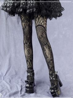 Black Totem Pattern Tights Edgy Fitted Black Tights, Fitted Edgy Black Tights, Black Gothic Stretch Legwear, Gothic Black Stretch Legwear, Black Stretch Gothic Leggings, Gothic Black Thigh High Leggings, Black Gothic Tight Bottoms, Black Tight Gothic Legwear, Plaid Tights