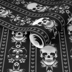 skulls and hearts on a black background with white trimmings for a tablecloth