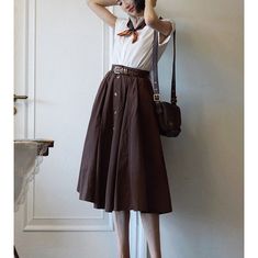 A retro denim skirt that will make you look like a calm lady.
 The two colors of brown and cream are washed cotton fabric,
 The blue is finished in lightweight, non-stretch denim.
 Try putting together a simple item with the skirt as the main role.



 <color>



 Brown

 blue

 cream






 <Size>





 XS size



 Length: 73cm

 Waist: 62cm




 small size



 Length: 75cm

 Waist: 66cm




 medium size



 Length: 76cm

 Waist: 70cm




 L size



 Length: 77cm

 Waist: 74cm











 <Material>



 cotton






 <model wearing>



 wearing size



 small size




 model dimensions



 Height: 170cm

 Weight: 55kg

 Bust: 84cm

 Waist: 65cm

 Hip: 94cm









 <Caution>



 Belt is not included. High-waist Beige Cotton Skirt, High Waist Beige Cotton Skirt, Cotton Midi Denim Skirt For Day Out, Brown Cotton Skirt For Fall, Brown Cotton Knee-length Bottoms, Classic High-waist Cotton Skirt, Classic High Waist Cotton Skirt, Long Brown Cotton Skirt, Brown Cotton Long Skirt