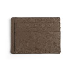 Introducing our Men's Card Holder Wallets, crafted from luxurious Italian cow leather featuring an elegant epsom pattern. Designed for both style and functionality, this wallet is an essential accessory for everyday use. Key Features: Material: Premium Italian cow leather with a sophisticated epsom pattern. Color: Khaki, offering a versatile and timeless appeal. Structure:6 credit card slots for organized storage.2 slider pockets for additional cards or receipts.1 top central pocket for bills or other essentials.RFID blocking function to safeguard your personal information. This card holder wallet combines quality craftsmanship with practical features, making it a perfect companion for modern gentlemen who appreciate both style and security. Beige Minimalist, Mens Card Holder, Organized Storage, Classic Office, Tabletop Accessories, Modern Gentleman, Unique Bags, Male Cards, Bar Accessories