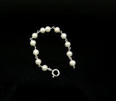 925 sterling silver customized solid silver pearls baby bracelet, excellent gift for new born baby, stylish jewelry from india.Metal-925 sterling silver.Item type-Baby braceletLength-4.5 inches.pearl size-5 mm approx.Weight-3.140 grams.Stamped-925.Makes excellent gift for baby, birthday, Christmas day. Silver Rosary Bracelet For Wedding, Wedding Silver Rosary Bracelet, Sterling Silver White Gold Bracelets With Pearl Chain, White Gold Sterling Silver Bracelets With Pearl Chain, Classic Silver Beaded Jewelry As Gift, White Gold Sterling Silver Bracelet With Pearl Chain, Classic Silver Beaded Jewelry Gift, Sterling Silver Pearl Chain Jewelry With Round Beads, Pearl White Sterling Silver Bracelet With Round Beads