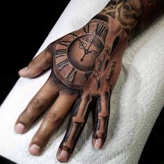 a person's hand with a clock tattoo on it and the words kadinlar portal