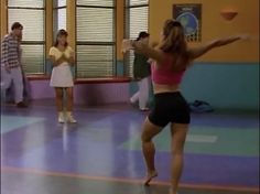 a group of young women dancing in a dance studio