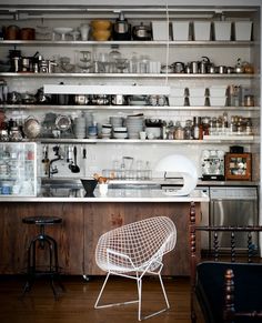 a kitchen filled with lots of pots and pans