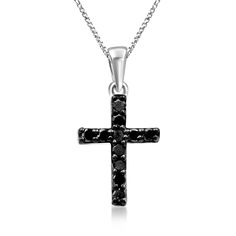 Ross-Simons - .10ct t. w. Black Diamond Cross Pendant Necklace in Silver. 18". This .10 ct. t. w. round brilliant-cut black diamond cross pendant necklace offers a bold and modern take on a classic religious symbol. Crafted in polished sterling silver and suspended from a box chain. Black rhodium. Springring clasp, black diamond cross pendant necklace. Diamond birthstones are the perfect gift for April birthdays. Black Cross Pendant For Formal Occasions, Classic Black Cross Jewelry, Black Cross Pendant Necklace For Formal Occasions, Black Cross Jewelry For Formal Occasions, Pendant Necklace Diamond, April Birthday, Diamond Birthstone, Religious Symbols, Fine Jewelery