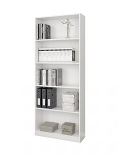 a white book shelf filled with lots of books