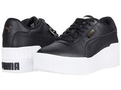 PUMA Cali Wedge - Women's Shoes : Puma Black/Puma White : Classic sneaker design in the front, wedge in the back. Take your style to the next level with the clean, raised profile of the PUMA Cali Wedge shoes. Wedge sneakers in a cushioned, sporty silhouette. Synthetic leather upper with perforated vamp. Platform midsole design with wedge heel for added lift and support. Gold metallic PUMA branded tab at lateral side. Rubber outsole provides traction and durable wear. Imported. Measurements: Heel Puma Cali Wedge, Puma Cali, Sneaker Design, Shoes Puma, White Puma, Puma White, Black Puma, Sneakers Athletic, Puma Women