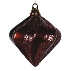 a brown ornament hanging from a string