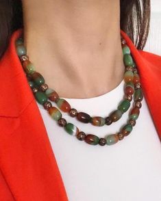 Agate and Lava Stone Multistrand Beaded Necklace ✅ NECKLACE FEATURES * Handmade Item: Each necklace is meticulously crafted by hand, ensuring quality and uniqueness. * Materials: patterned green and brown natural agate stone, brown lava stone, gold plated details and chain * Length: 43 cm (17 inches) + 5 cm (2 inches) adjustment chain.    -If you require a longer extension chain, please let me know. * Color Discrepancies: Please be aware that color variations may occur due to different monitor settings. * Natural Stone Variations: Natural stones may vary slightly in size, shape, and color tones due to their unique characteristics. These small differences make your jewelry special and one-of-a-kind. ⭐️ This elegant necklace features tube-shaped agate stones in green and brown tones, along w Agate Beaded Necklaces For Jewelry Making, Elegant Agate Beaded Necklaces With Colorful Beads, Long Agate Beaded Necklace With Polished Beads, Elegant Agate Necklaces With Colorful Beads, Elegant Colorful Agate Beaded Necklaces, Elegant Agate Beaded Necklace, Vintage Beaded Necklace With Natural Stones, Multicolor Agate Necklaces With Large Beads, Green Agate Beaded Necklaces With Colorful Beads