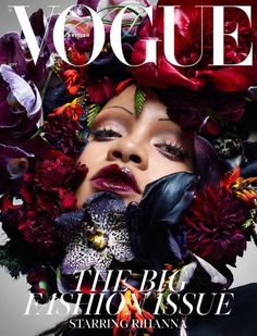 a woman with flowers in her hair and makeup on the cover of a fashion magazine