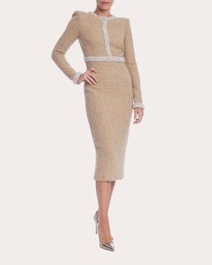 Classically chic, this long-sleeve dress crafts its structured sheath shape from neutral-hued tweed. Lustrous pearl trim along the collar, bodice, waistline and cuffs reflects refined elegance. Back-zip closure Padded shoulders Fitted waistline Pearl embellishments Vented back hem Tweed Self: 70% polyester, 30% tweed Lining: 100% polyester Spot clean Imported Size & Fit Model (wearing size US 2): 6ft tall, 32in bust, 24in waist This style runs slightly small. If you are in-between sizes, we reco 70 Outfits, Below The Knee Skirt, Knee Skirt, Jacquard Skirt, Crepe Skirts, Knee Skirts, Dress Crafts, Tweed Dress, Silk Charmeuse