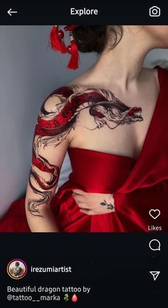 a woman in a red dress with tattoos on her arm