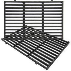 two black grill grates sitting on top of each other