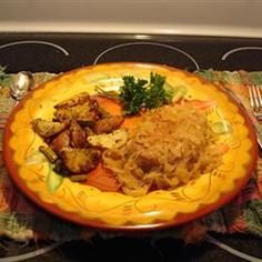 a pie with meat and vegetables in it sitting on a table