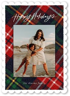 an image of a woman and her daughter on a plaid background with the words happy holidays