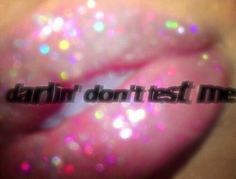 the words darhir don't test me are written in front of a pink lip