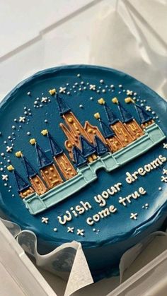 a birthday cake in a box that says wish your dreams come true on the side