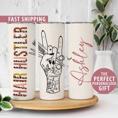 three personalized coffee mugs with the words fast shipping and hand drawn designs on them