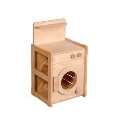 a wooden toy washing machine on a white background