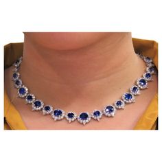 The Following Item we are offering is a Rare Important Estate Radiant Large Rare Fancy GIA Certified 18KT Gold Certified Ceylon Blue Sapphire and Diamond Necklace. Necklace is comprised of Rare Gorgeous Large Blue Sapphires each surrounded by a Halo of Large Roun, Marquise, and Pear Cut Diamonds!!! T.C.W. approx 52CTS!!! This Gorgeous Necklace is a Rare Masterpiece from a Private Manufacturer that sold to a Private Manufacturer that sold to select Five Star Hotel Jewelry Store and Comes Brand Ne