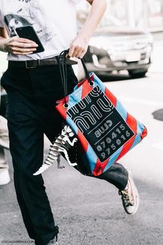 Miu miu bag with dinosaur keychain Dinosaur Keychain, Collage Outfits, Miu Miu Handbags, Fashion Week Outfit, New York Street Style, Miu Miu Bag, Nyfw Street Style, Collage Vintage, Mk Bags