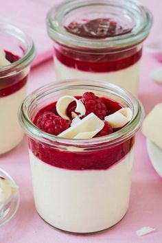 raspberry cheesecake in a jar with whipped cream