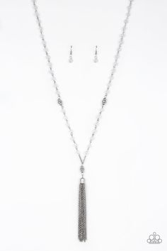 White opaque crystal-like beads, shiny silver beads, and white rhinestone encrusted rings give way to a shimmery silver tassel for a whimsical look. Features an adjustable clasp closure.

 Sold as one individual necklace. Includes one pair of matching earrings. Earrings Matching, White Beaded Necklaces, Matching Bracelet, Necklace White, Paparazzi Accessories, White Necklace, White Rhinestone, Paparazzi Jewelry, Matching Bracelets