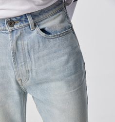 A variation on our best selling denim, introducing the Cropped 90s Denim in Light Vintage Blue. Inspired by classic 90’s streetwear culture and the signature oversized trends seen throughout that period, with a unique ILU spin. Whether you’re looking to transition into a more relaxed look or you love your baggy denim and on the hunt for an easy jean with a clean, cropped style. Fitting much roomier across the hip and thigh than our previous denim, with tapering towards the ankle before a slight crop for the ideal look. A staple for those wanting to incorporate a classic into their style with a more modern take. Wear with a Box or Relaxed Tee for a complete look. Male Model: 185cm (6ft) Height // 75kg Weight // 31" Waist // Wears: Medium Fits & Features - Cropped denim jean- Classic 5 pocke Streetwear Culture, Baggy Denim, 90s Denim, Pocket Bag, Cropped Style, Cropped Denim, Leather Patches, Height And Weight, Denim Jean