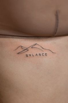 a woman's stomach with the word blyancee written on her side