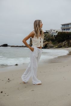 We went on a search for the perfect drawstring linen pants, and WE FOUND THEM. These are so versatile, lightweight, comfy and the highest quality. They are 100% linen which means they are durable and will last you a lifetime! You will be living in these pants for years! Model Info: Taylor is 5'9 wearing size Small. Paired With: Capri Knit Vest Top Also available in Black: Bondi Linen Pants // Black Fabric Info: 100% Linen Summer Linen Bottoms For Everyday, Relaxed Linen Pants For Beach, Relaxed Linen Beach Bottoms, Summer Linen Straight Leg Pants, Summer Straight Leg Linen Pants, Breezy White Linen Bottoms, White Breezy Linen Bottoms, White High-waisted Linen Pants, Linen Wide-leg Beach Pants