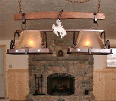 a fire place with two bells hanging from it's ceiling and a fireplace in the background