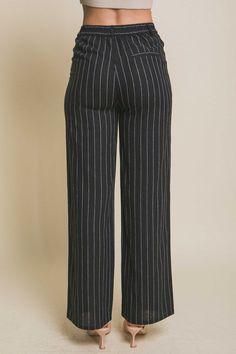 These Linen Stripe Flannel Pants offer a sophisticated and stylish look with their classic black color. Made with high-quality linen, they are durable and comfortable to wear. The subtle stripe pattern adds a touch of elegance. Perfect for any occasion, these pants are the ideal addition to your wardrobe. Fabric & fit: 55% LINEN, 45% VISCOSE Model is wearing size Small. Flannel Pants, Swimwear Cover Ups, Swimwear Cover, Black Linen, Pants Pattern, Striped Pants, Matching Dresses, Stripes Pattern, Short Sets