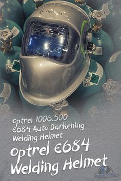 an advertisement for a welding helmet on the back of a motorcycle with lots of ornaments around it