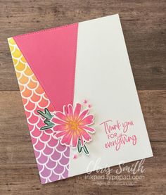 a handmade card with pink, yellow and orange flowers on the bottom half of it