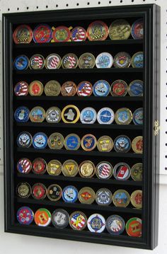 a display case filled with lots of different types of badges