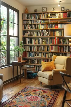 a living room filled with furniture and lots of books on the shelves next to a window