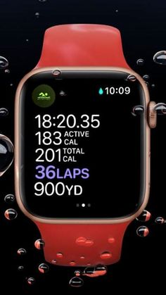 an apple watch with water droplets around it and the time displayed on its display screen