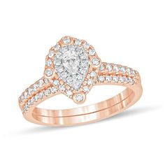 With playful details, this diamond bridal set complements her modern aesthetic. Fashioned in precious 10K rose gold, the charming engagement ring showcases a 1/8 ct. pear-shaped diamond. The double diamond-lined frame sparkles with a quartet of bezel-set diamonds while additional diamonds line the shank. The perfect complement, the coordinating diamond-adorned band completes her ensemble. Captivating with 5/8 ct. t.w. of diamonds and a bright polished shine, this bridal set is a great way to sta Rose Gold Bridal Sets Fine Jewelry, Rose Gold Diamond Bridal Sets In Fine Jewelry, Rose Gold Diamond Bridal Set, Double Frame, Double Diamond, Diamond Bridal Sets, Bezel Set Diamond, Pear Shaped Diamond, Bridal Set