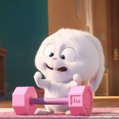 the secret life of pets bunny is playing with pink dumbbells in this scene from the movie