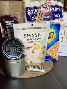 some snacks are sitting on a wooden tray