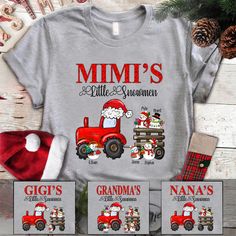 Mimi's Little Snowmen Trator Christmas T-ShirtIf you looking for a personalized t-shirt to show your love to your family, it's will be best choice. Our Classic T-Shirt serves as the perfect short-sleeved shirt for your unique, funny, or personalized designs. Features such as a lay flat collar and a classic?ÿunisex cut will make this your new favorite t-shirt. Brand: Gildan Heavy weight fabric Classic unisex?ÿmakes this an easy fit Size up if you want something roomier Our shirts include:- Sport Cute Nickname, Snowman Shirt, Christmas Red Truck, Custom Tee Shirts, 2022 Christmas, Grandma Shirt, Name Christmas, Flat Collar, Grandma Shirts