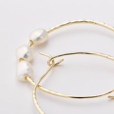 Beautiful jewelry with simple, elegant designs and a classic look Hammered Gold, Pearl Hoop Earrings, Elegant Designs, Simple Elegant, Gold Hoops, Baroque Pearls, Jewelry Branding, Classic Looks, Freshwater Pearls