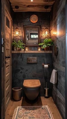 a rustic bathroom with wood paneled walls and flooring, including a wooden toilet