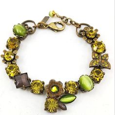 Featuring Lime Green & Yellow Rhinestones, This Vintage Lacontessa Never Worn Bracelet Features Geometric, Floral & Insect Shapes. Measures 7.25" In Length. Mint Condition. Elegant Adjustable Yellow Crystal Bracelet, Elegant Yellow Beaded Crystal Bracelet, Elegant Yellow Jewelry With Rhinestones, Yellow Jeweled Wedding Jewelry, Jewelry Styles, Styles Inspiration, Rhinestone Bracelet, Vintage Rhinestone, Womens Jewelry Bracelets